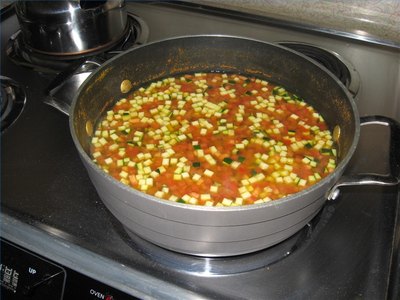 Chana cooking with tomato, zucchini