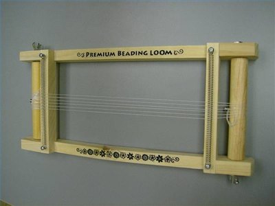 Loom is now warped or threaded and ready for you to bead your project.