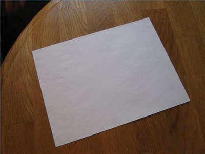 Lay out your paper on a clean, smooth surface.