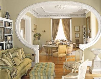 An archway framed in crown molding.