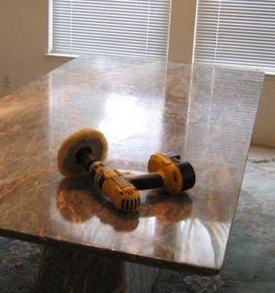 Prepping to remove small scratches from marble.