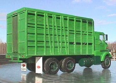 A 1959 cab-over-engine, or COE, cattle hauler Peterbilt.