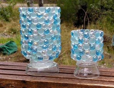 Glass baubles glued onto jam jars