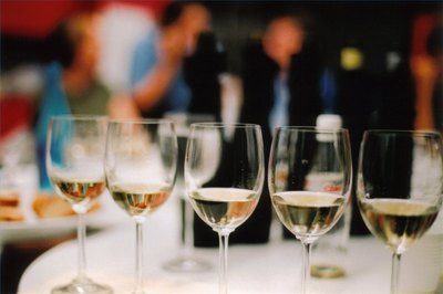 glasses lined up at wine tasting