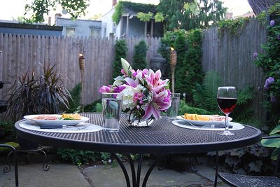 Romantic dinner table for two in the garden.