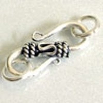 S Clasp secures at either end.