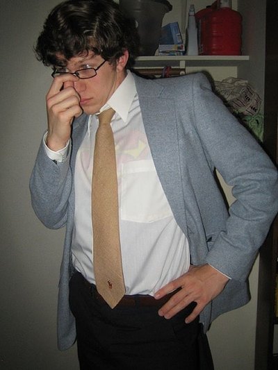 Dressed as Clark Kent with a suit