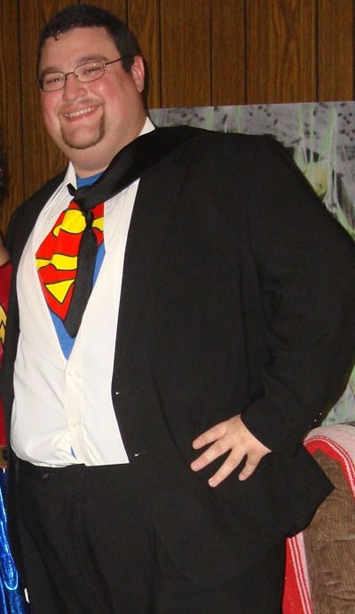 Guy dressed as Clark Kent as Superman