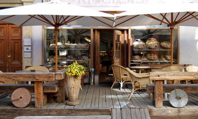 Farm stores incorporate a lot of wood and flowers into the decor.