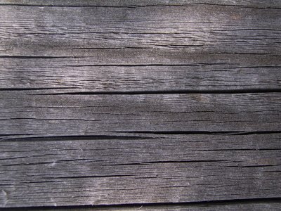 Weathered wood can be repainted while preserving the aged look.