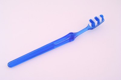 Use a toothbrush to help you get used to something touching your palate.