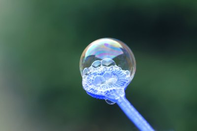 The player who pops the most bubbles before they hit the floor is the winner.