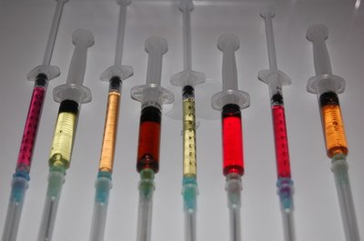 Used syringes must be placed in labeled puncture-proof containers.