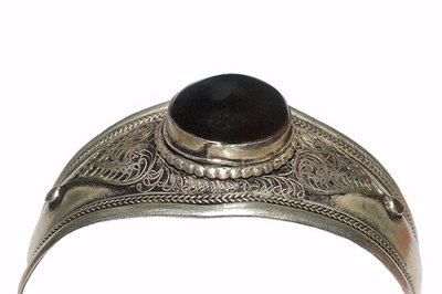A metal bracelet is a fairly easy consumer item to create using a lathe.