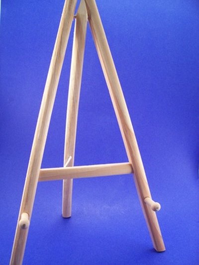 Set up an easel with a piece of poster board or blank canvas at the entrance for guests to sign.