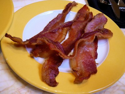 A common breakfast food, bacon is usually smoked and fried.