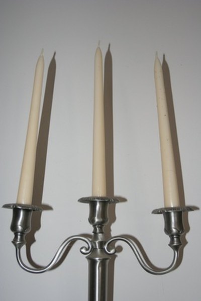 Start with simple candle holders and then work your way to increasingly decorative candelabra.