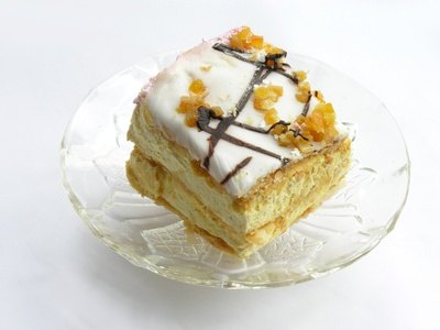 Napoleons are often covered with fondant and chocolate in a striped pattern.