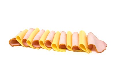 Cold cuts and cheese on a tray allow guests to make their own cracker sandwiches.
