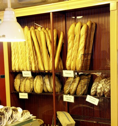 Parisian boulangeries showcase baked goods in glass cases and towering baskets.