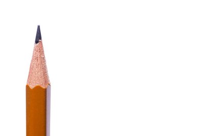 The tooth design is drawn with pencil onto each piece of poster board.