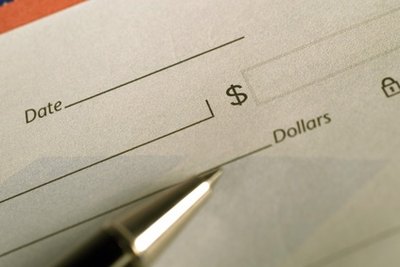 You can order checks through the bank or an outside vendor.