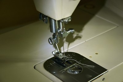 Presser foot and feed dogs