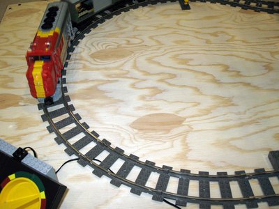 Attach the train track with a screw driver and screws.