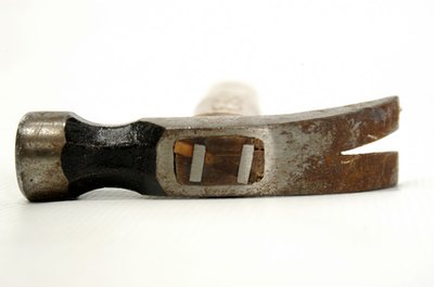 Use a hammer or cat's paw to remove nails.