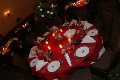 Use inexpensive white crockery from a discount store to set a festive, winter table.