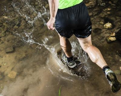 Running through a stream.