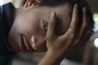 Vietnamese man suffering from severe disabilities due to exposure to dioxins.