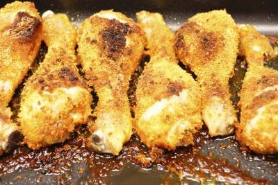 Bake breaded chicken drumsticks in the oven to enjoy a healthy and quick meal.