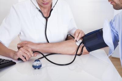 Reading blood pressure.