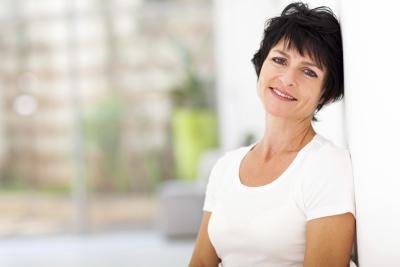 woman leaning on wall