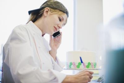 Baker takes an order on the phone
