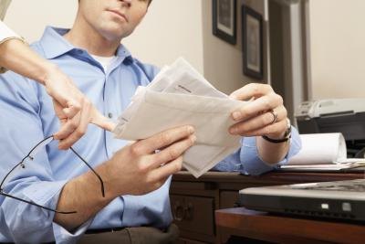 man looking at patents