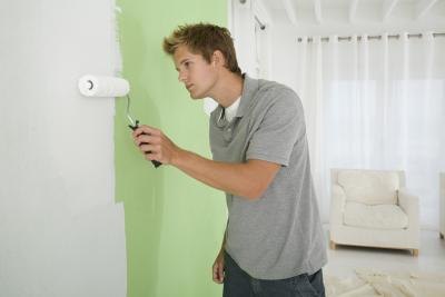 Man painting wall