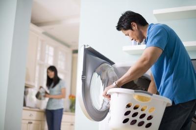 Man washing linens