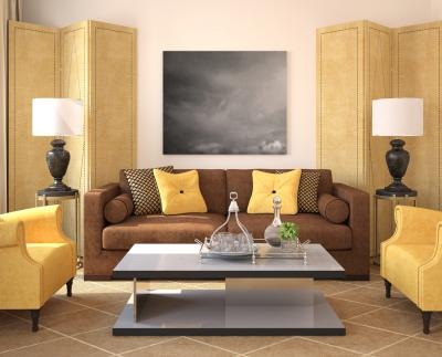 brown couch accented by yellow walls