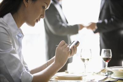 Manager in background at restaurant