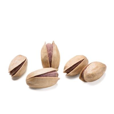 Red pistachios inside normal shell.