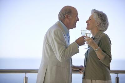 Old couple toasting