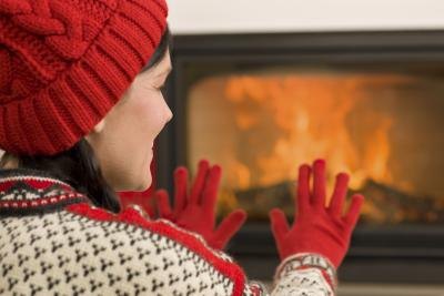 Woman wearing holiday sweater by party