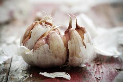 A crushed bulb of garlic.