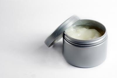Container of hair product.