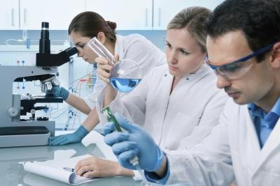scientists in chemical laboratory