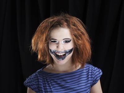 Teen girl in Halloween costume.
