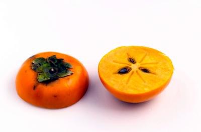 Persimmon cut in half.