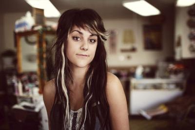 Young girl with long hair extensions.